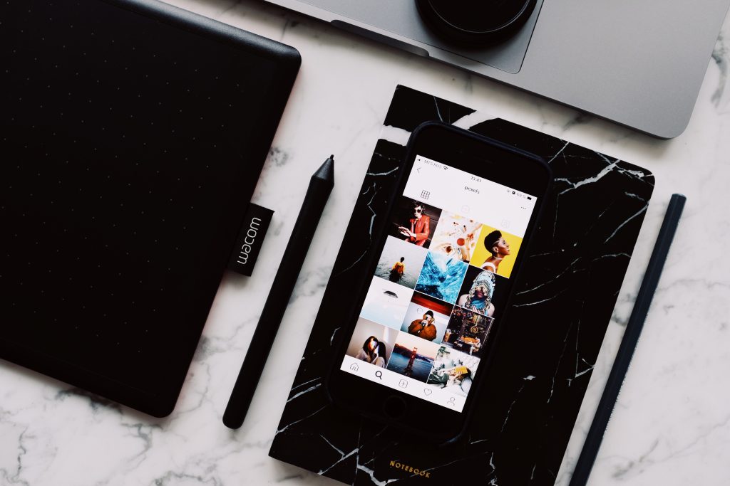 Which tools for generating social media posters, graphics, videos with minimal description?